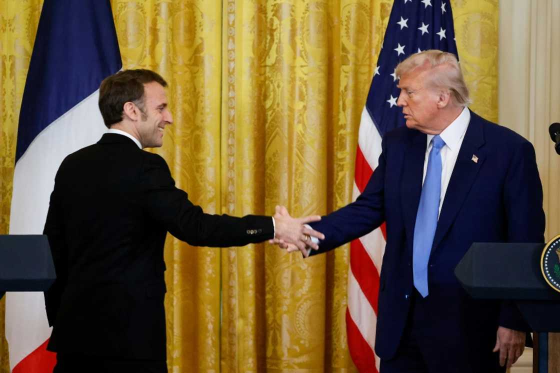 US President Donald Trump said tariffs he has unveiled on Canada and Mexico are going ahead as planned, in a press conference after talks with French President Emmanuel Macron