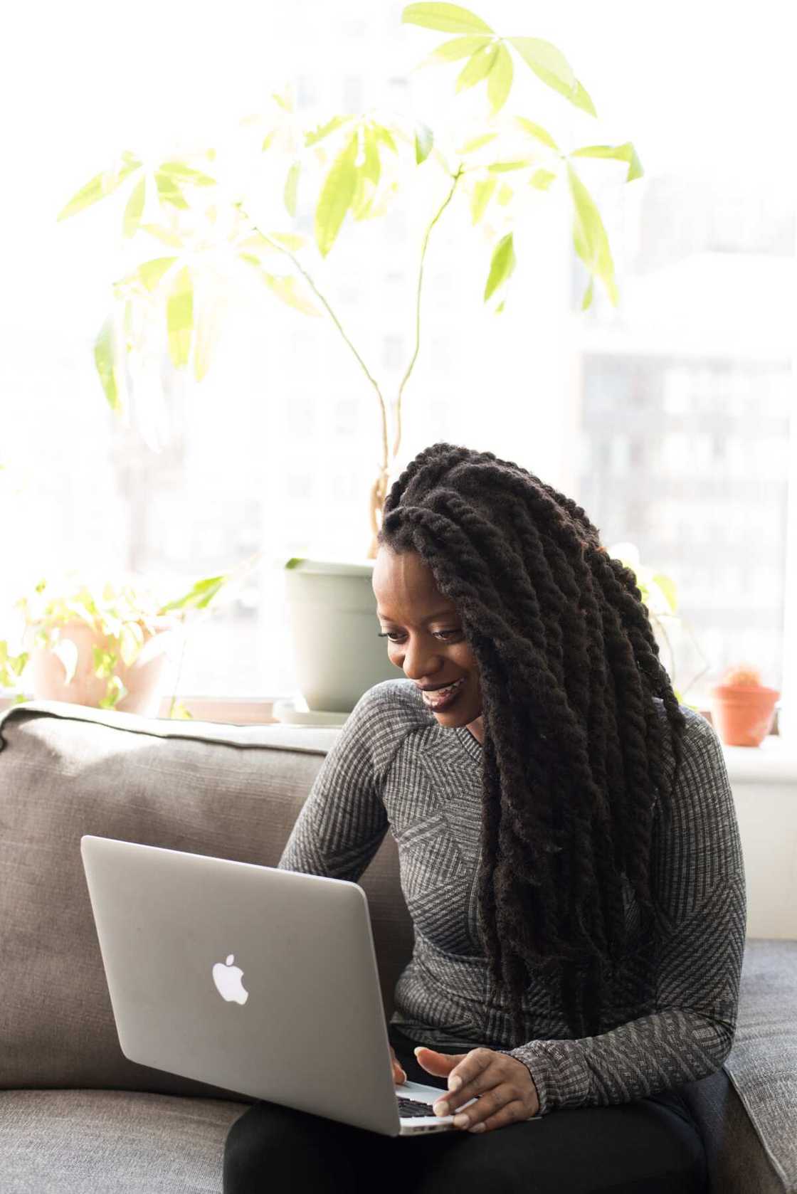Woman registering on a dating site in Nigeria Woman registering on a dating site in Nigeria