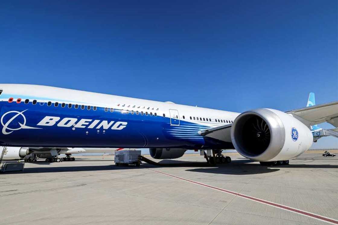 This picture taken on November 13, 2023 shows a view of the fuselage and one of the engines of a Boeing 777-9 jetliner aircraft on the tarmac during the 2023 Dubai Airshow at Dubai World Central - Al-Maktoum International Airport in Dubai. This picture taken on November 13, 2023 shows a view of the fuselage and one of the engines of a Boeing 777-9 jetliner aircraft on the tarmac during the 2023 Dubai Airshow at Dubai World Central - Al-Maktoum International Airport in Dubai.