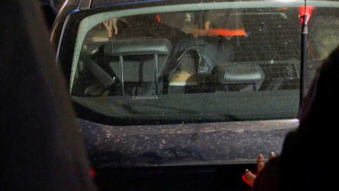 A video grab taken from AFPTV on September 1, 2022, shows a man who attempted to shoot Argentine Vice-President Cristina Kirchner being held in a police vehicle -- local media later reported that his companion was also arrested A video grab taken from AFPTV on September 1, 2022, shows a man who attempted to shoot Argentine Vice-President Cristina Kirchner being held in a police vehicle -- local media later reported that his companion was also arrested