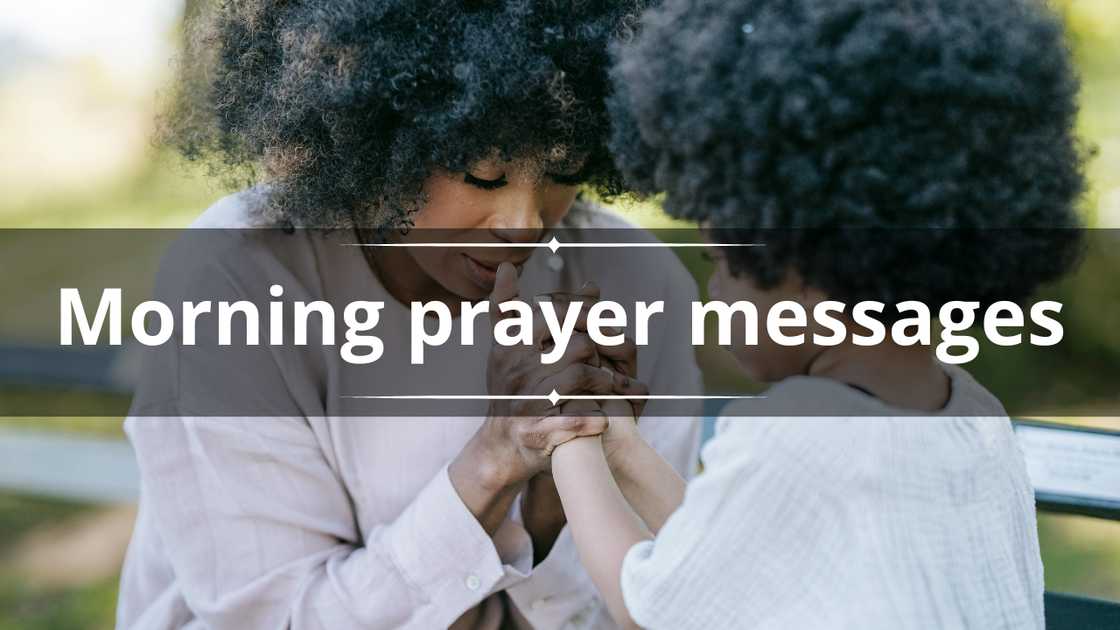 A woman and a young girl are praying together