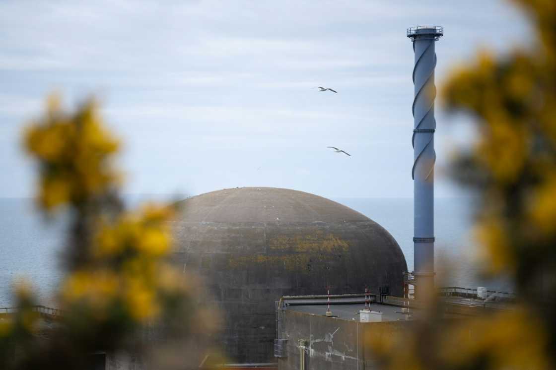 Birds fly over the nuclear power plant of Flamanville, northwestern France, which started 12 years behind schedule Birds fly over the nuclear power plant of Flamanville, northwestern France, which started 12 years behind schedule