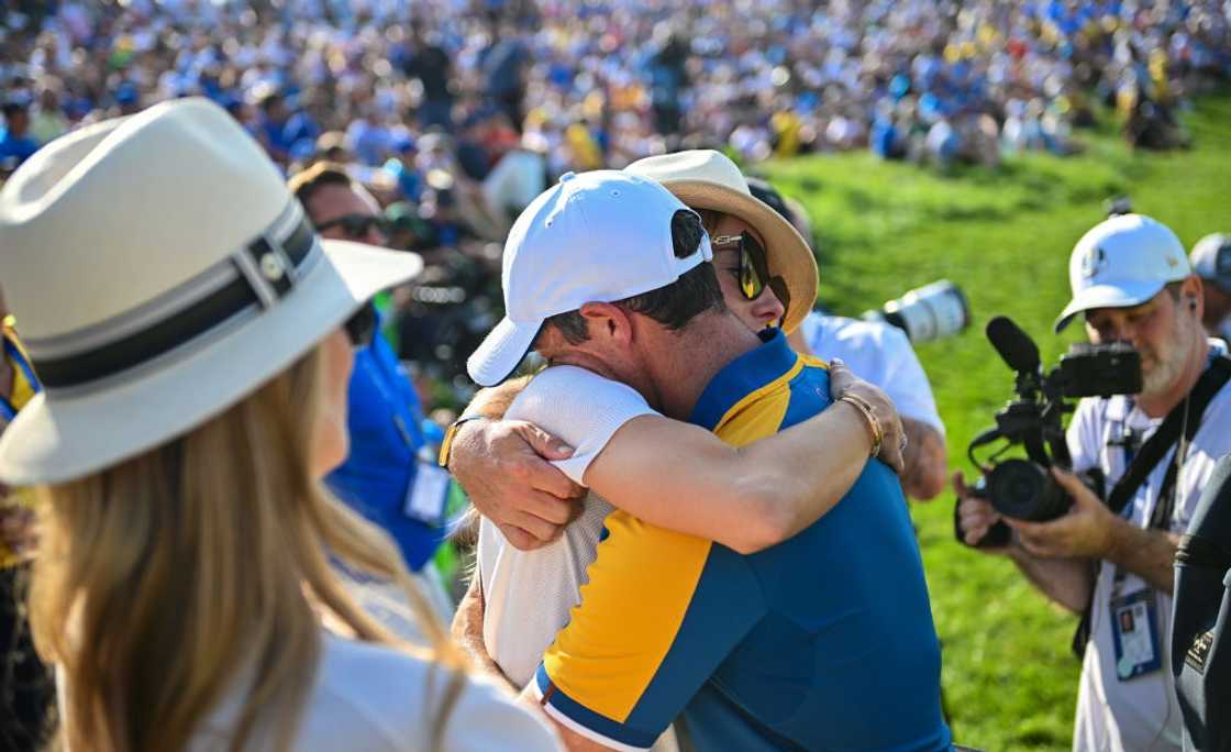 Rory McIlroy of Europe embracing his wife Erica Stoll Rory McIlroy of Europe embracing his wife Erica Stoll