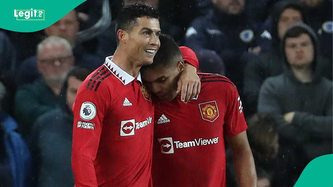 Cristiano Ronaldo celebrates with Casemiro after scoring against Everton at Goodison Park. Photo by Tom Purslow