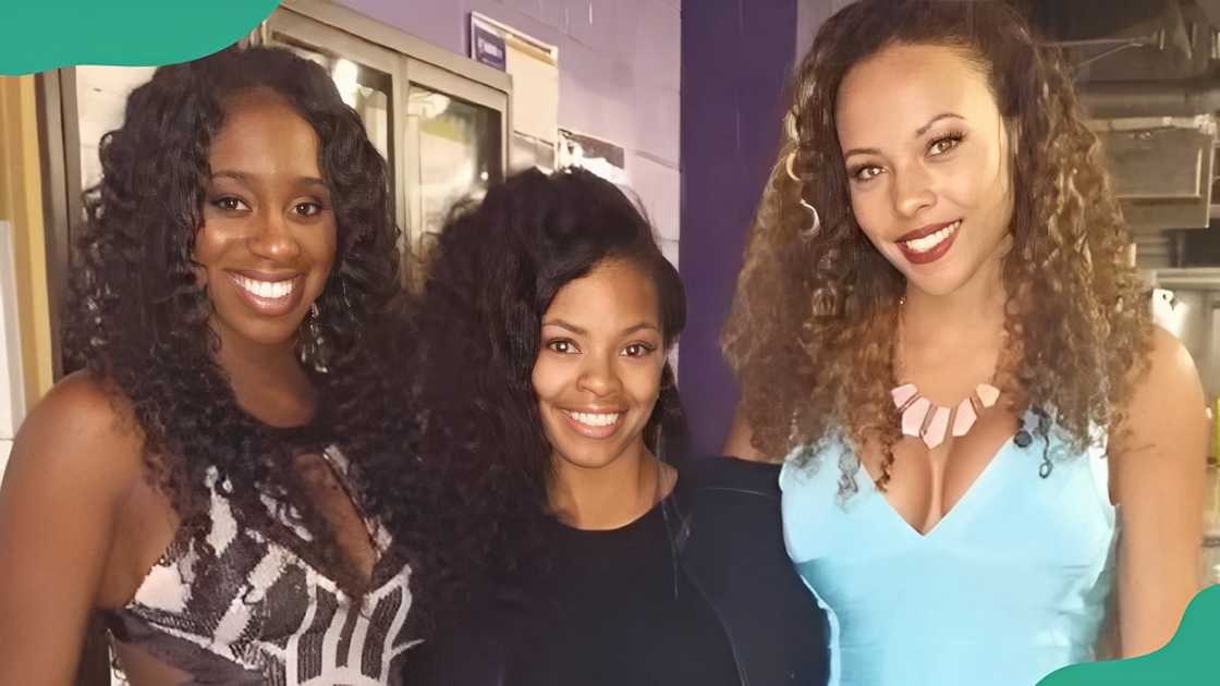 Jimmy Uso's Wife Trinity (L) with Jey Uso's Wife Takecia Travis (C) and Roman Reigns Wife Galina (R).