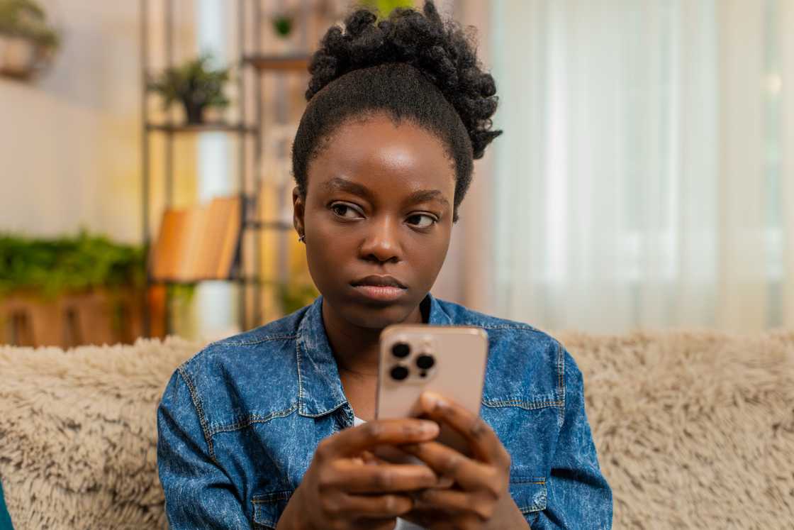 A lady is texting A lady is texting