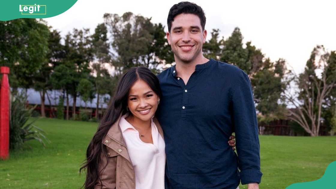 Jenn Tran and Devin Strader embracing each other outdoors Jenn Tran and Devin Strader embracing each other outdoors