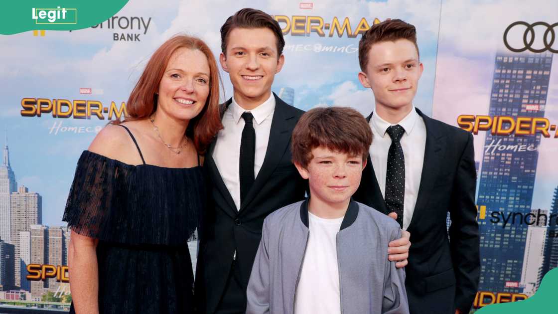 Tom Holland with his mother and brothers