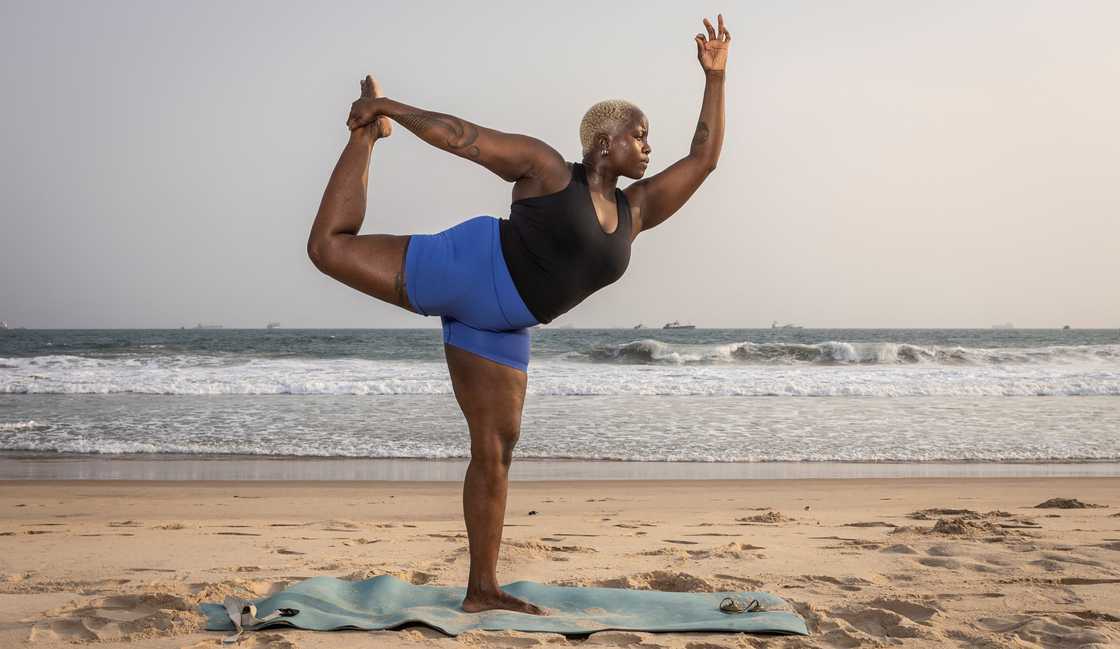 Sandra Patrick, a yoga teacher, doing yoga Sandra Patrick, a yoga teacher, doing yoga