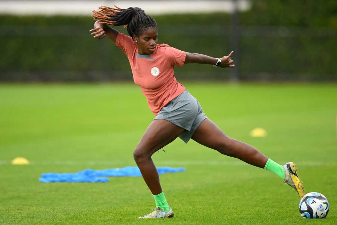 Esther Okoronkwo stretches during a training session Esther Okoronkwo stretches during a training session