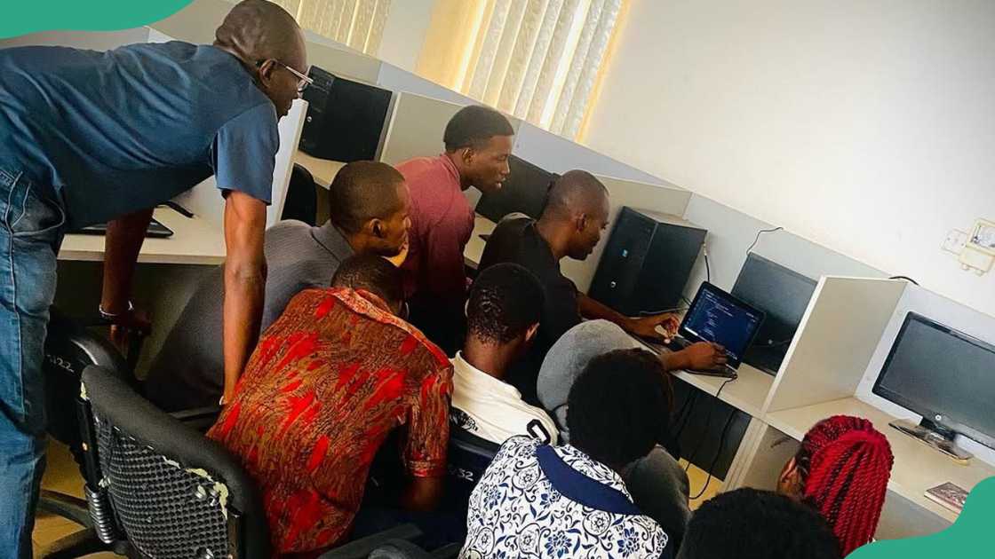 University of Nigeria students take a lesson in a computer lab University of Nigeria students take a lesson in a computer lab