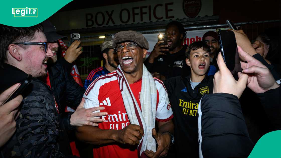 Arsenal legend Ian Wright celebrates with supporters at Emirates Stadium. Photo: Leon Neal Arsenal legend Ian Wright celebrates with supporters at Emirates Stadium. Photo: Leon Neal