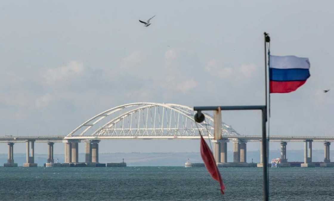 The symbolic bridge is a vital transport link for carrying military equipment to Russian soldiers fighting in Ukraine