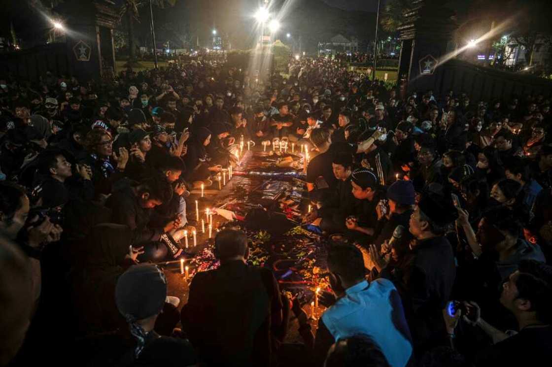 The announcement came as anger grew over the police response to a pitch invasion