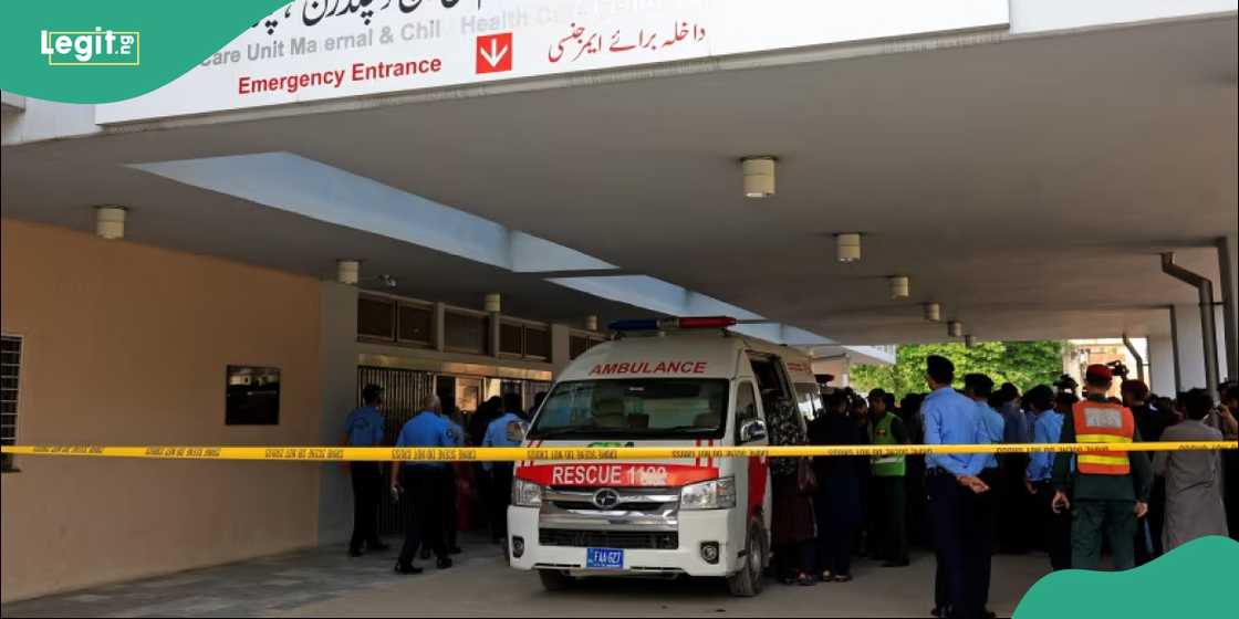 Families gather outside PIMS following the deadly nursery fire.