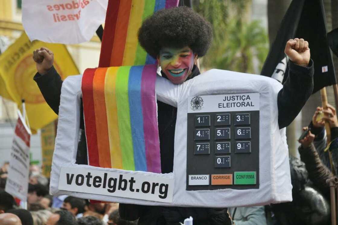 Some were dressed as electronic voting machines, whose exclusive use Bolsonaro claims makes cheating easier Some were dressed as electronic voting machines, whose exclusive use Bolsonaro claims makes cheating easier