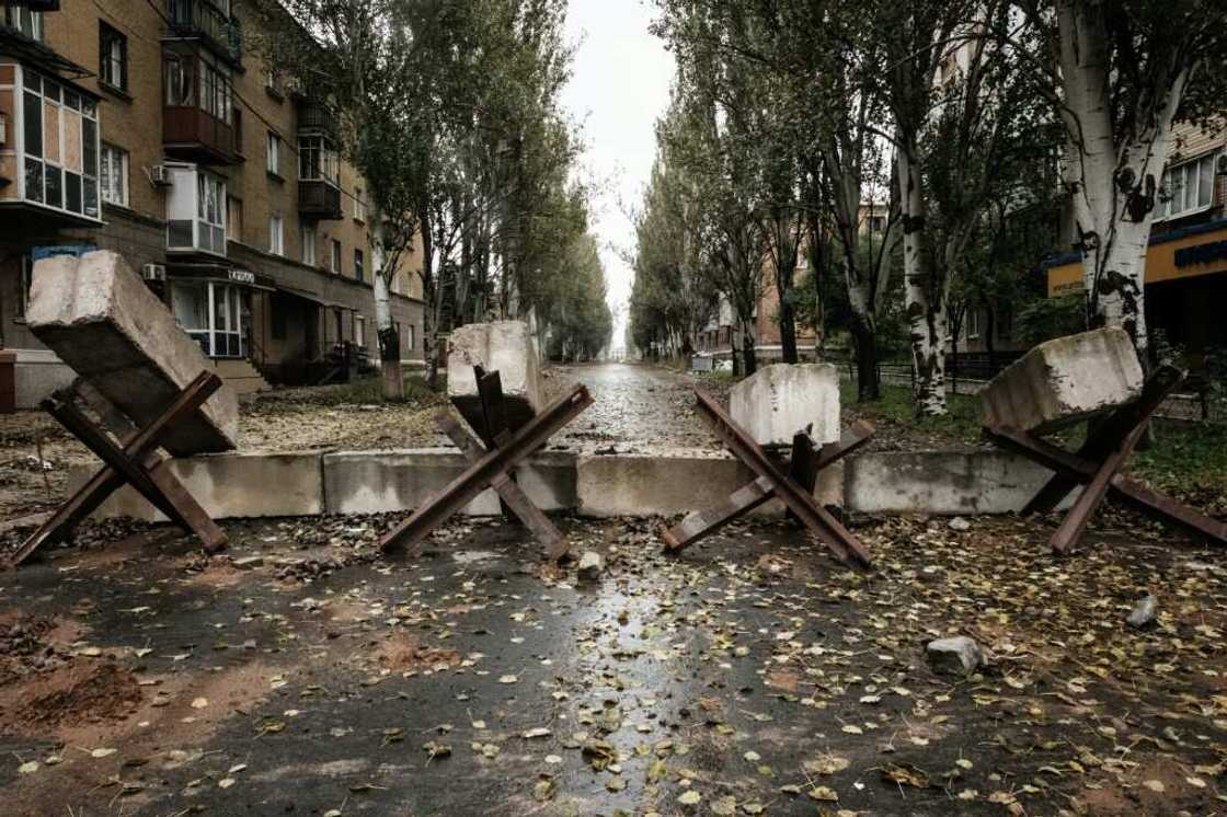 Ukrainian forces have been defending Bakhmut since Russian troops attacked the city in May, and the streets are lined wth rubble and tank traps Ukrainian forces have been defending Bakhmut since Russian troops attacked the city in May, and the streets are lined wth rubble and tank traps