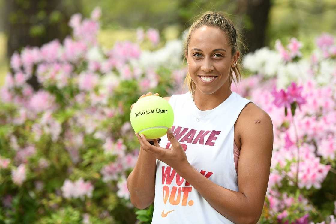 Madison Key holds a tennis ball Madison Key holds a tennis ball