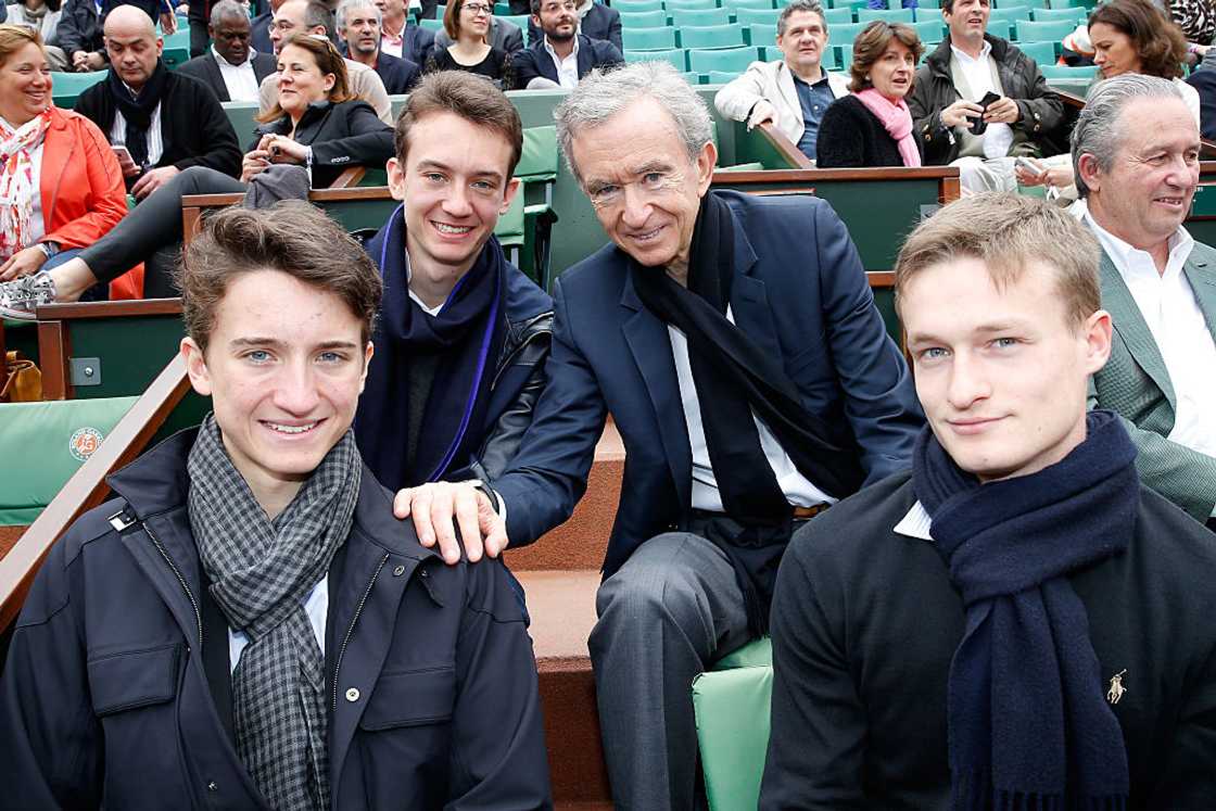 Bernard Arnault (BR), his sons Frederic (BL), Jean (FL)