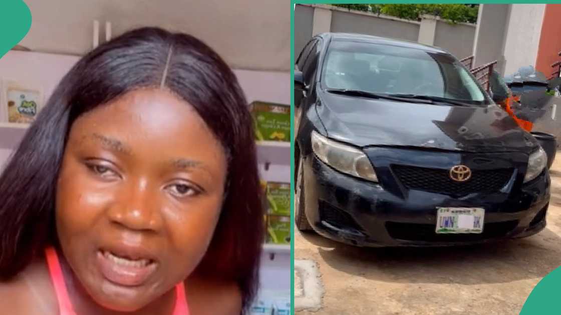 Lady maintains her old Toyota car.