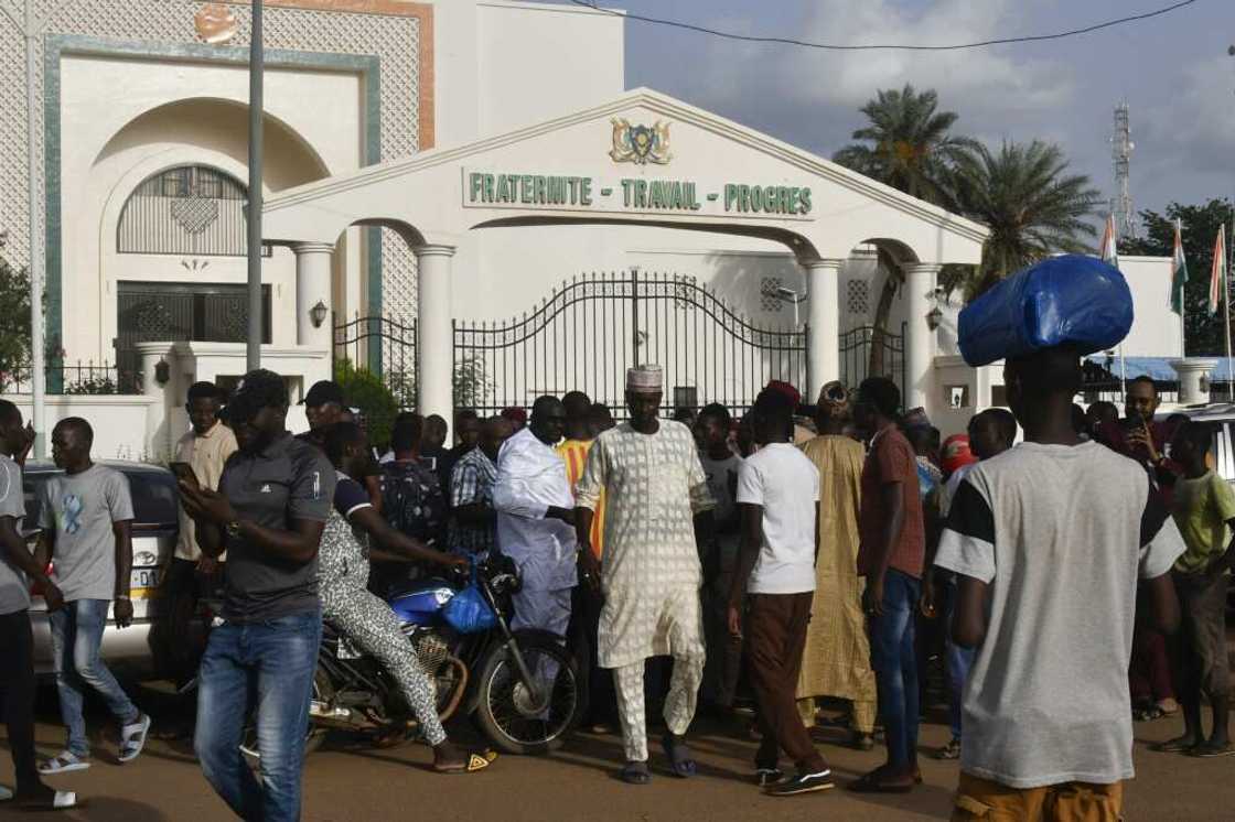 A rally by supporters of Niger's President Mohamed Bazoum in Niamey on July 26, the day of his ouster. An online video of the scene was later used to claim a similar rally on August 6 A rally by supporters of Niger's President Mohamed Bazoum in Niamey on July 26, the day of his ouster. An online video of the scene was later used to claim a similar rally on August 6