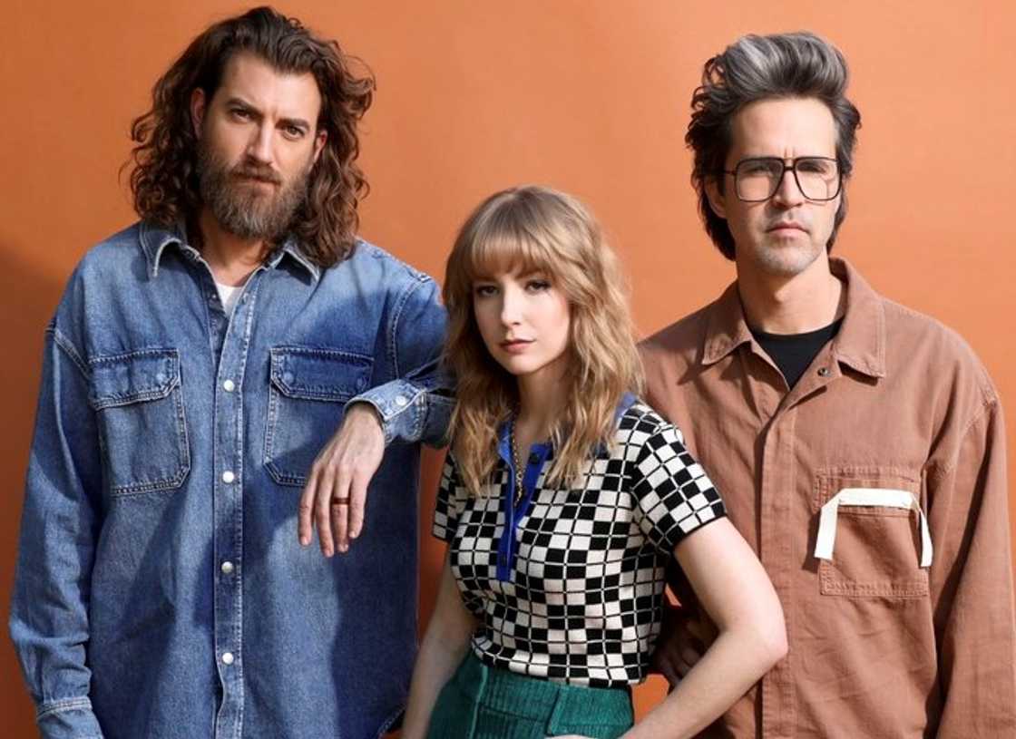 Rhett McLaughlin and Link Neal pose with Stevie Wynne Levine