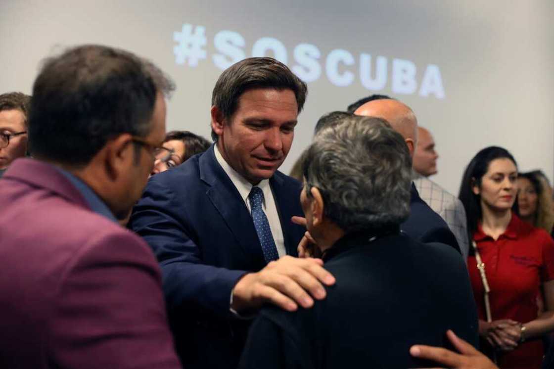 Governor Ron DeSantis of Florida greets people after holding a roundtable discussion at the American Museum of the Cuba Diaspora in Miami in July 2021 Governor Ron DeSantis of Florida greets people after holding a roundtable discussion at the American Museum of the Cuba Diaspora in Miami in July 2021