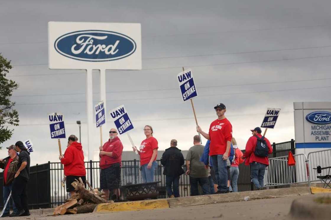 UAW workers, shown picketing outside of Ford's Wayne Assembly Plant last month, are returning to work after the company announced a tentative agreement with the United Auto Workers union UAW workers, shown picketing outside of Ford's Wayne Assembly Plant last month, are returning to work after the company announced a tentative agreement with the United Auto Workers union