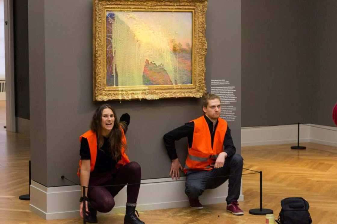 Eco-militants hurled mashed potato onto Claude Monet's 'Les Meules' in Germany, but it too was protected by glass