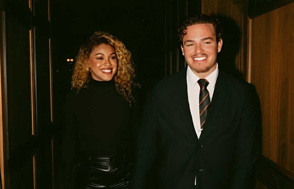 Hannah and Marco Donatell walk hand in hand Hannah and Marco Donatell walk hand in hand