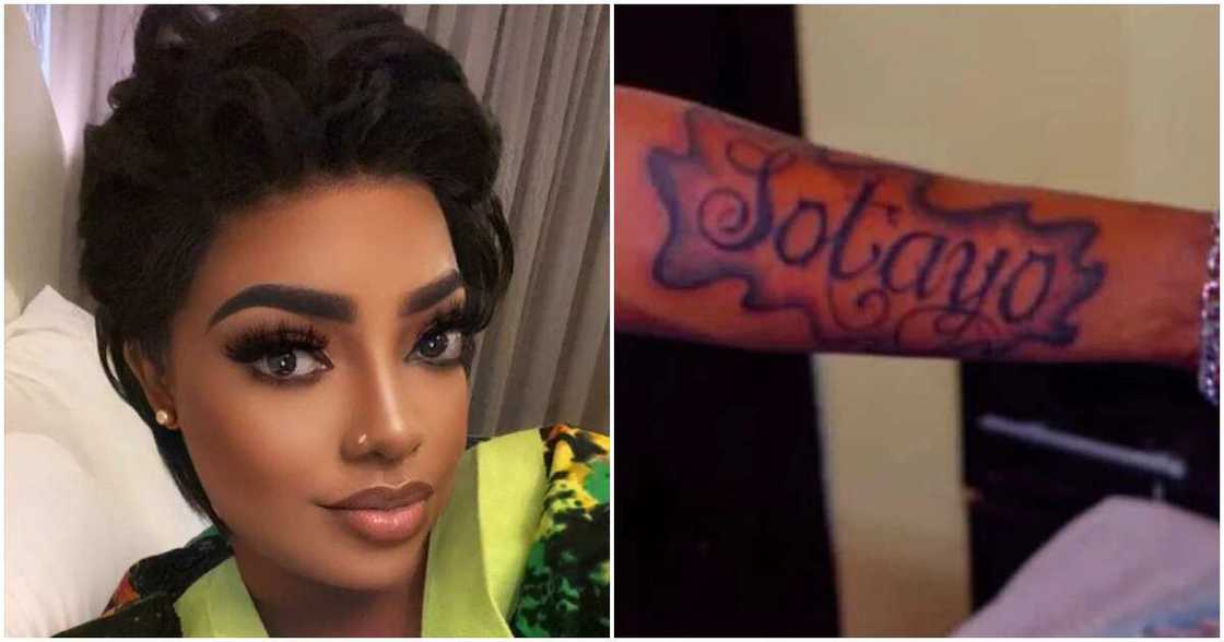 Sotayo Gaga and fan with tattoo of her name. Sotayo Gaga and fan with tattoo of her name.