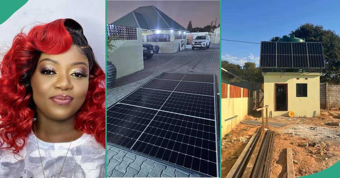 Woman excited as she installs many solar panels in her house Woman excited as she installs many solar panels in her house