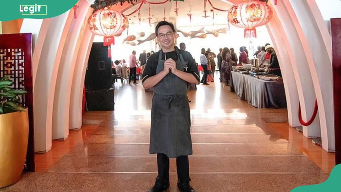 Master chef Chua standing at the entrance of the restaurant Master chef Chua standing at the entrance of the restaurant