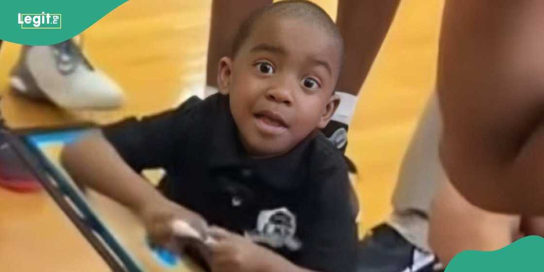 Little boy coaches basketball team Little boy coaches basketball team