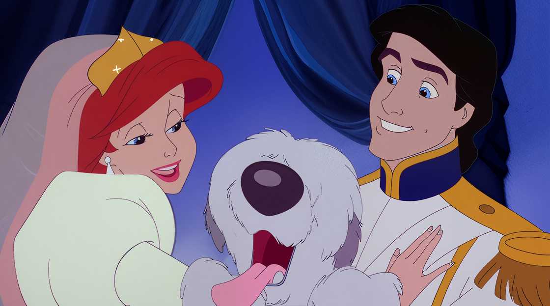 An illustration of a happy Max being held by Ariel and Prince Eric during their wedding. An illustration of a happy Max being held by Ariel and Prince Eric during their wedding.