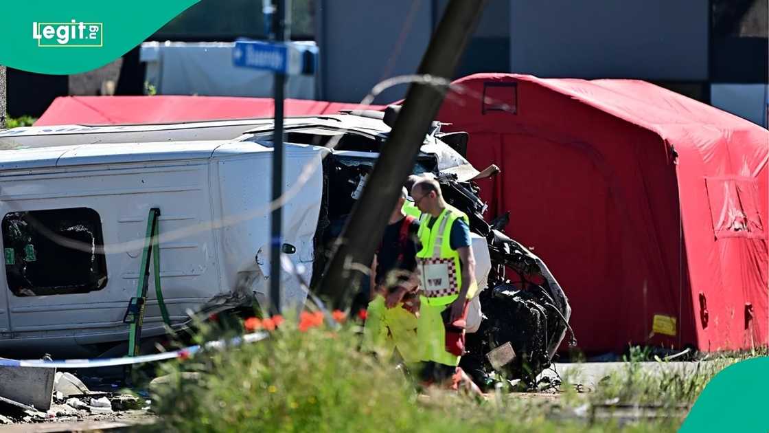 Investigators examine scene after train strikes school transport in Belgium, killing four people