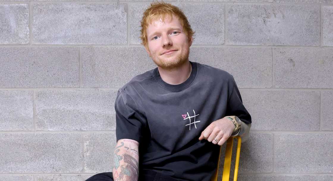 Ed Sheeran poses sitting during TikTok Presents Ed Sheeran's Play, Live