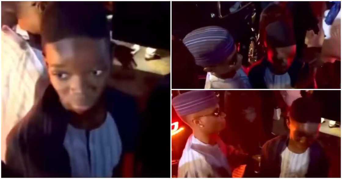 Wizkid and son Bolu at his mother's burial.