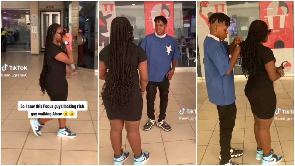 Lady approached strangers/man helped her to pack her hair. Lady approached strangers/man helped her to pack her hair.