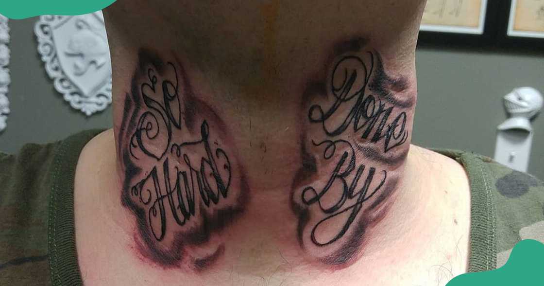 A symmetrical script style tattoo on the throat with cursive font.