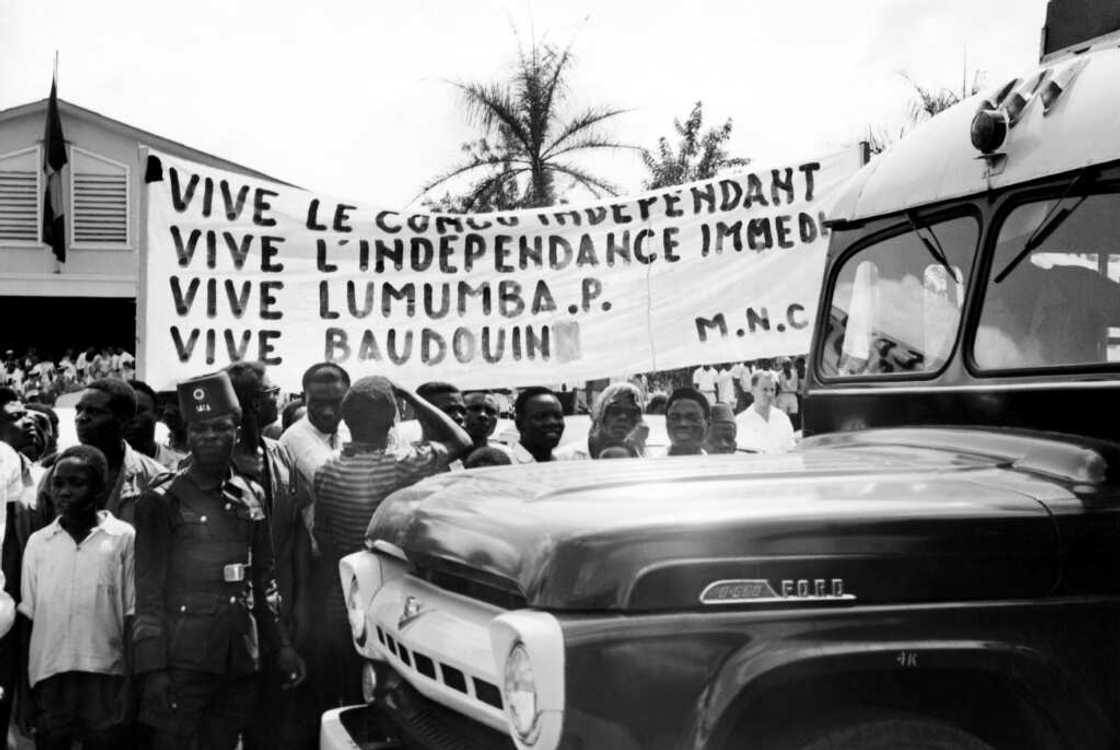 In a photo released in December 1960, Congolese in Stanleyville, as Kisangani used to be called, support Lumumba as King Baudouin of Belgium visits the former colony In a photo released in December 1960, Congolese in Stanleyville, as Kisangani used to be called, support Lumumba as King Baudouin of Belgium visits the former colony