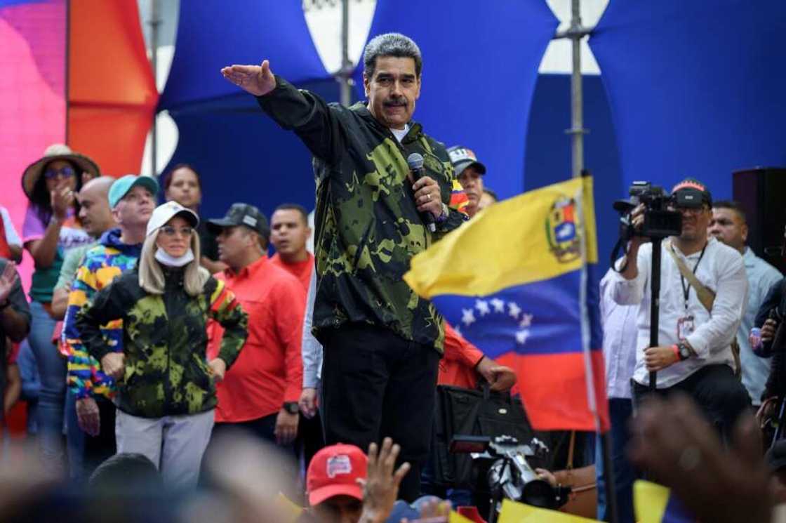 Venezuelan President Nicolas Maduro greets supporters during a rally in Caracas on January 23, 2024 Venezuelan President Nicolas Maduro greets supporters during a rally in Caracas on January 23, 2024