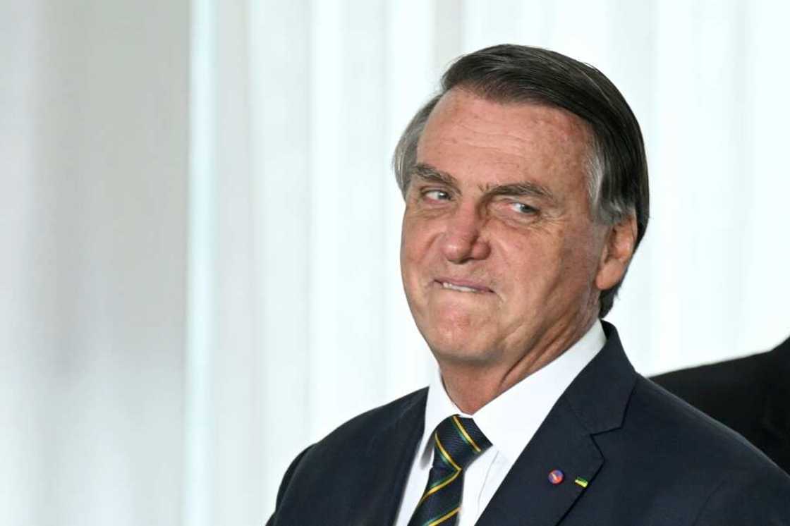 Brazilian President Jair Bolsonaro gestures during a meeting with lawmakers at Alvorada Palace in Brasilia in October 2022