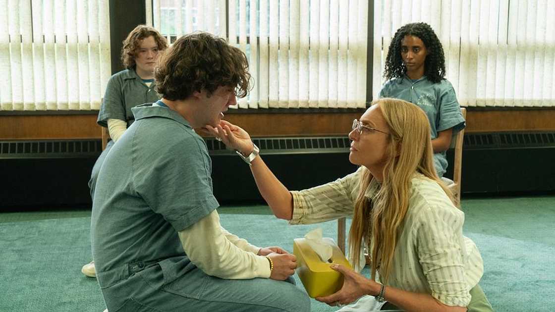 Evelyn Wade wipes the tears of another character