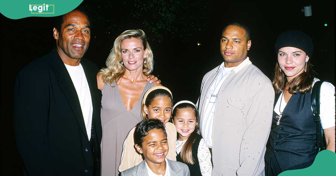 O.J. and Nicole Simpson pose with some of their children and other family members.