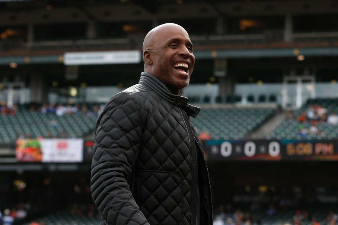 Former San Francisco Giants player Barry Bonds looks on in a black jacket Former San Francisco Giants player Barry Bonds looks on in a black jacket