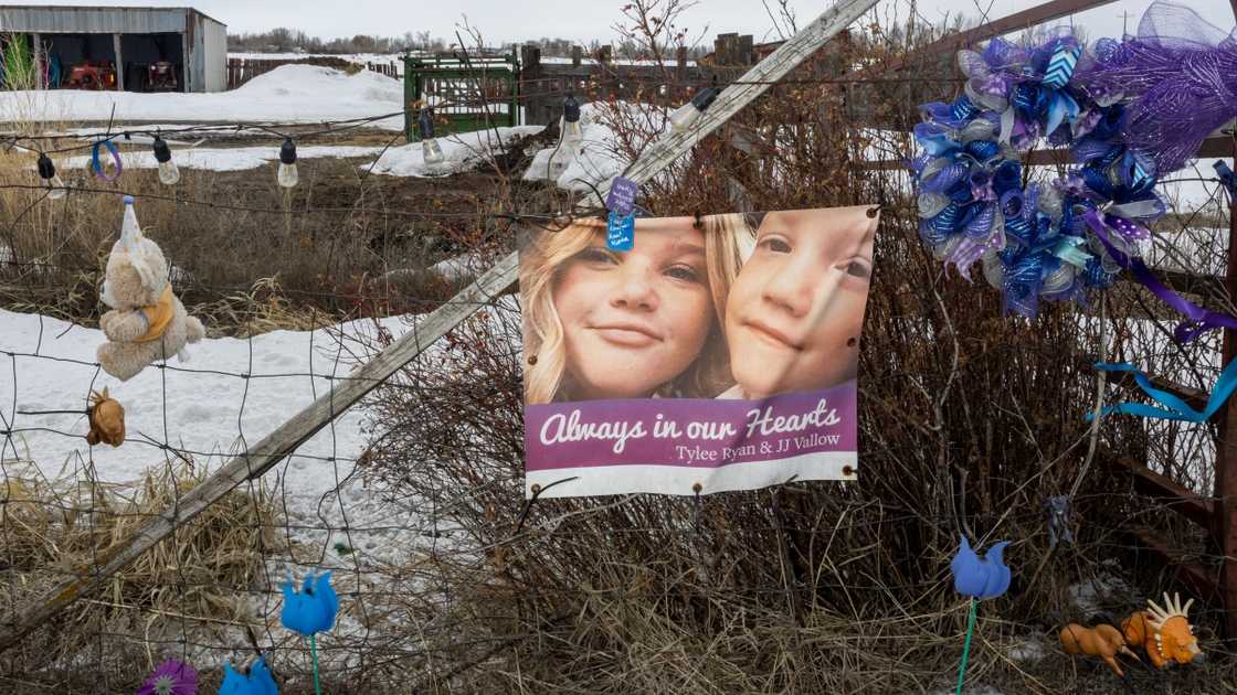 A fence with tokens and a photo of Tylee Ryan (L) and J.J. Vallow (R) A fence with tokens and a photo of Tylee Ryan (L) and J.J. Vallow (R)
