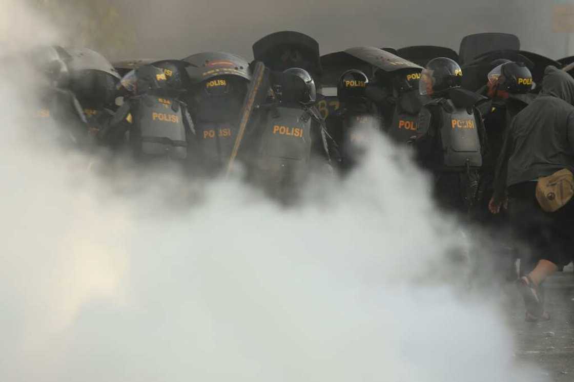 Indonesian riot police have faced off protests with aggressive means in cities across Indonesia Indonesian riot police have faced off protests with aggressive means in cities across Indonesia