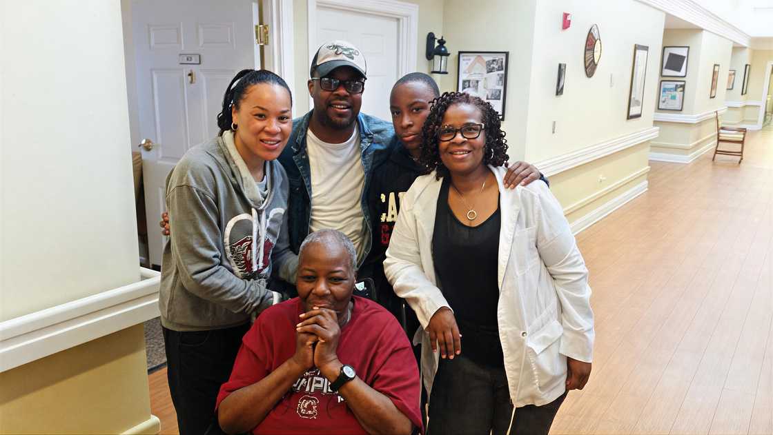 Dawn Staley posing with her family