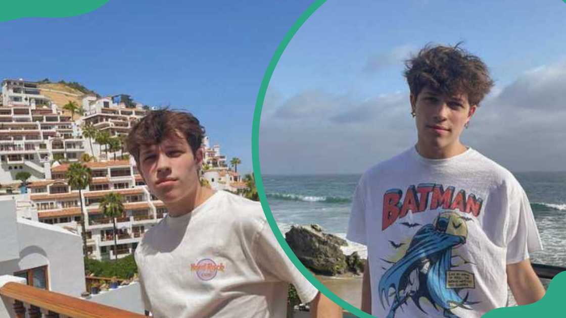 Nicolas stands by the ocean